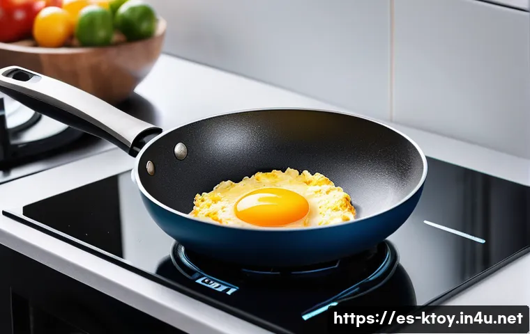 주방완구 리뷰 작성 팁 - A modern kitchen scene featuring a high-quality stainless steel frying pan with a durable non-stick ...